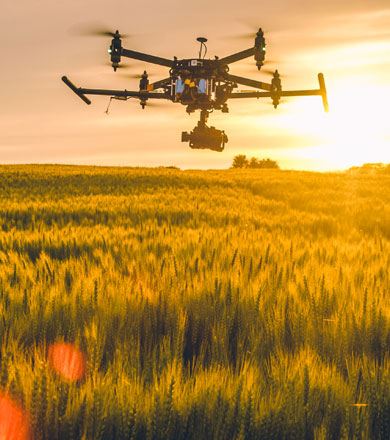Drone flying over farmland Drone flying over farmland