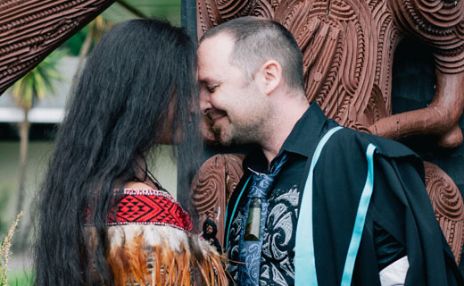 Graduate and tutor hongi