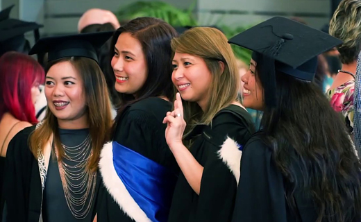 Graduates posing for a photo