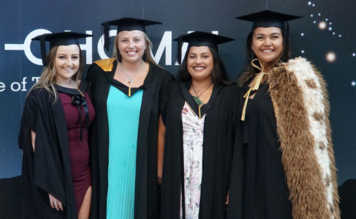 Graduates posing for a photo