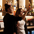 Bar Manager showing Hospitality student around