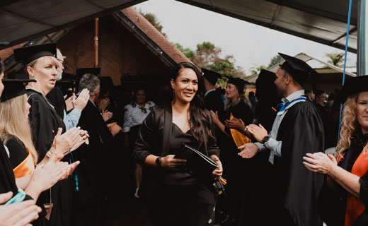 Toi Ohomai graduand walking through guard of honour