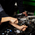 Automotive student working on a car