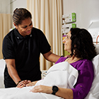 Health student checking in on patient