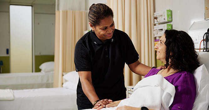 Health student checking in on patient