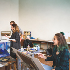 Creative students in class working on their art Creative students in class working on their art