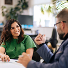 Postgraduate student talking with their tutor Postgraduate student talking with their tutor