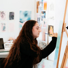 Creative student working on their artwork Creative student working on their artwork