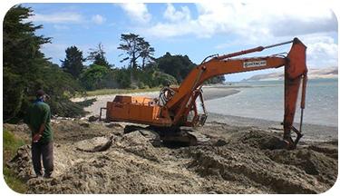 Digger in the sand