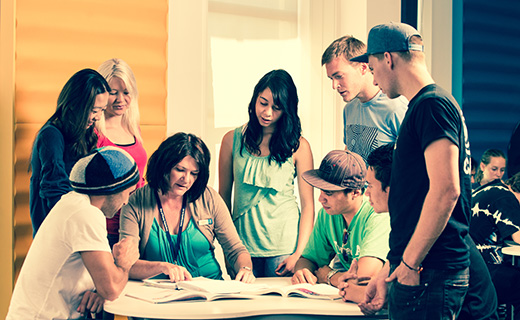Students with a tutor during a Bridging course