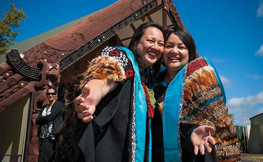 Graduates pose for a photo at Tangatarua Marae