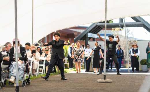 Tawhiri performing a haka at his mum's graduation ceremony.